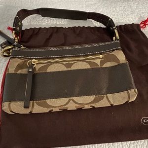 Never used Original Brown Coach logo Signature Purse with cloth bag
